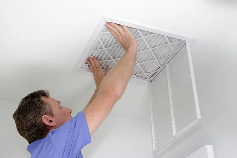 how do i clean my ac ducts myself?